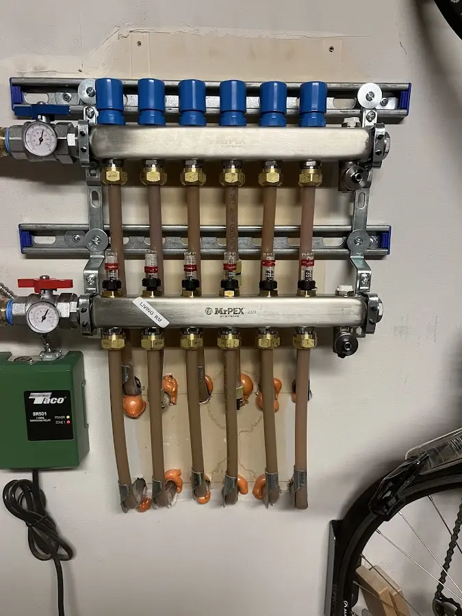 Plumber performing Gas Line Installation at a residential property in Marinette